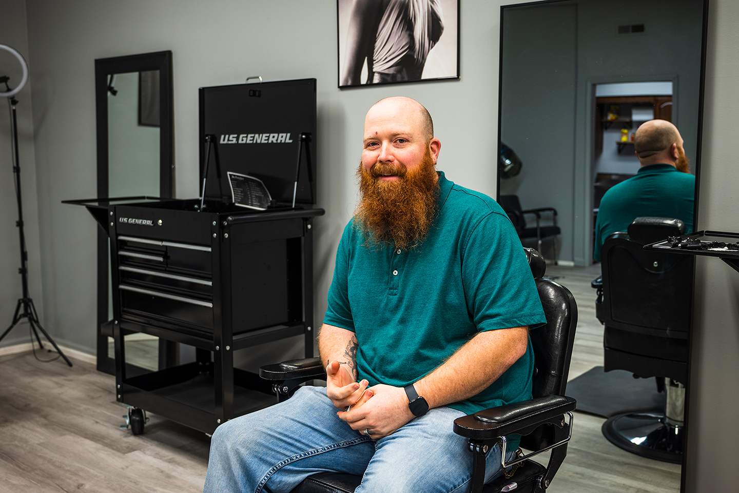 Breathitt Countian Lloyd Roberts sits in his antique barber chair in his newly opened salon, Studio 6, in Jackson, Ky, just months after graduating from the HCTC Cosmetology program.